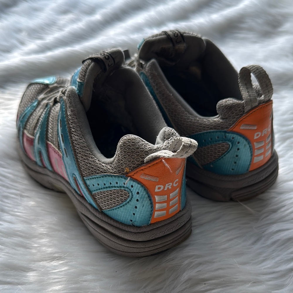 Blue and Pink Sneakers with Durable Soles and Layered Design